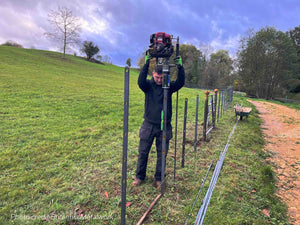 Estate fencing being installed around a field using Easy Petrol Post Driver