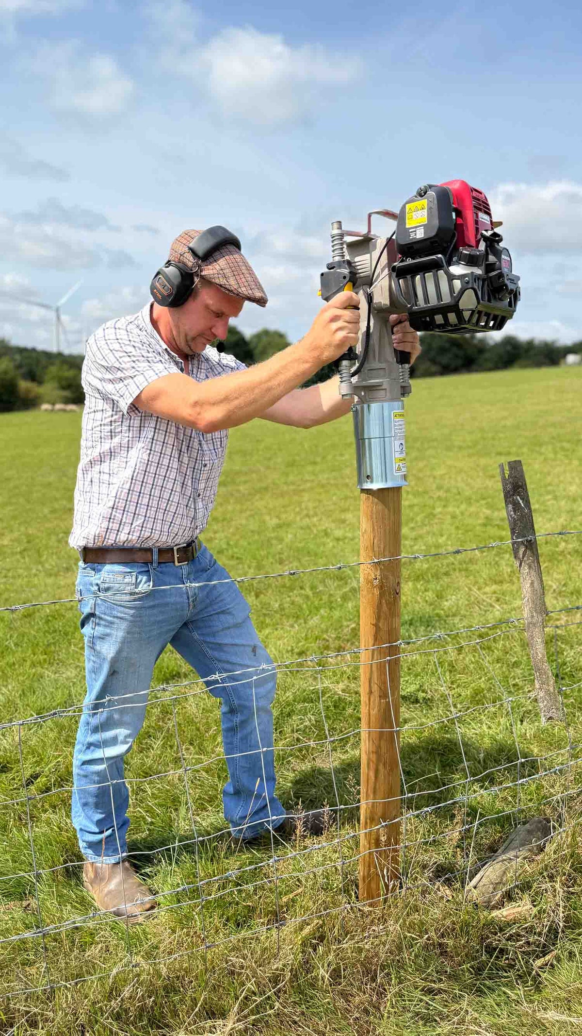Fenceline being repaired with 4&quot; timber posts, using an Easy Petrol Post Driver